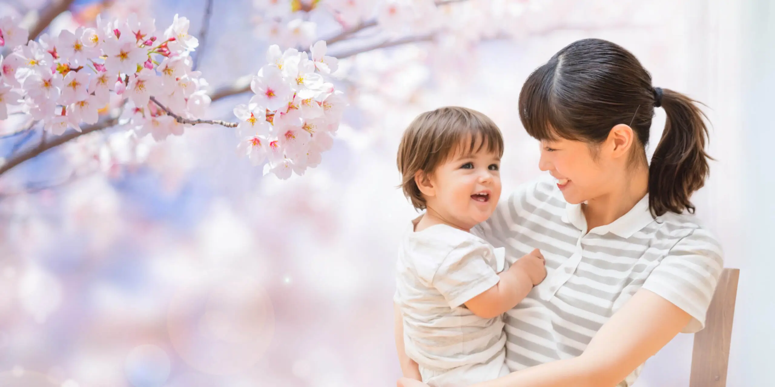 Mother and child with cherry blossoms